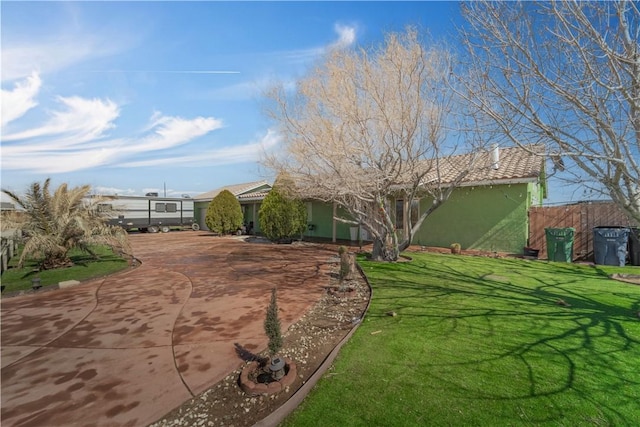 view of yard with fence