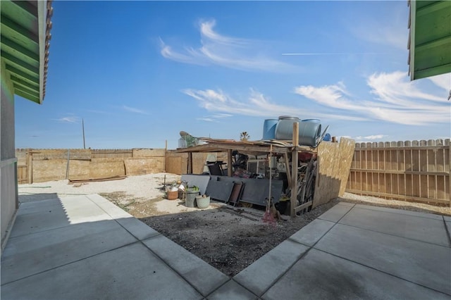 view of patio with a fenced backyard