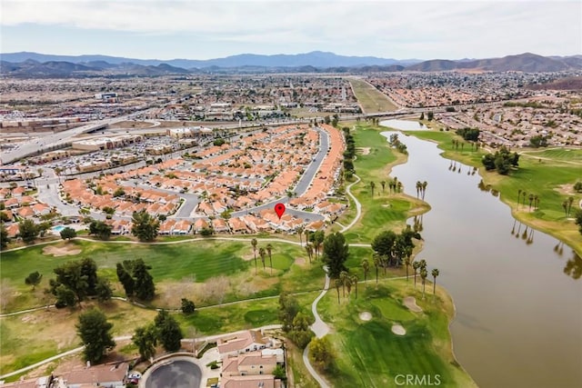 bird's eye view with a water and mountain view