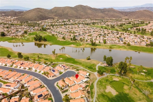 birds eye view of property with a residential view, golf course view, and a water and mountain view