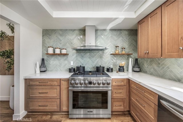 kitchen with stainless steel appliances, light wood-type flooring, wall chimney range hood, and open shelves