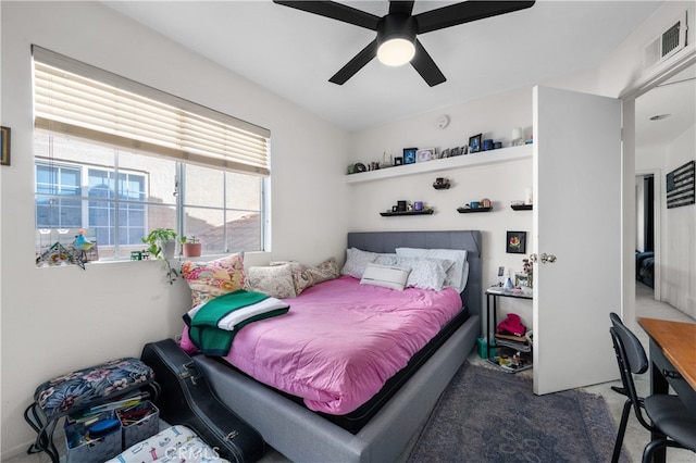 bedroom with visible vents and a ceiling fan