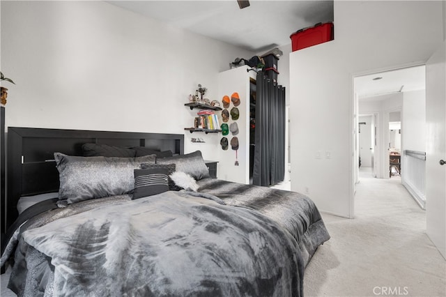 bedroom with light colored carpet