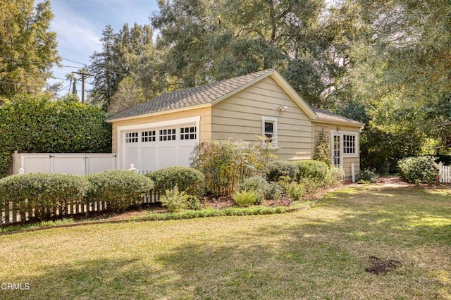 garage featuring fence