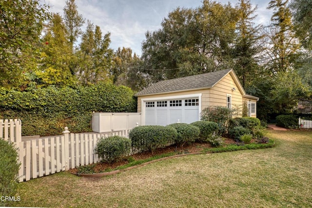 garage with fence