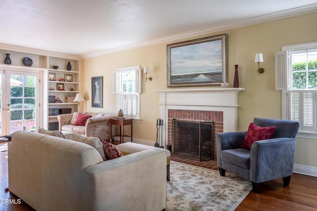 living room with a fireplace, baseboards, dark wood-type flooring, and crown molding