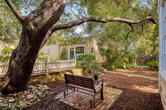 exterior space with a patio area and fence