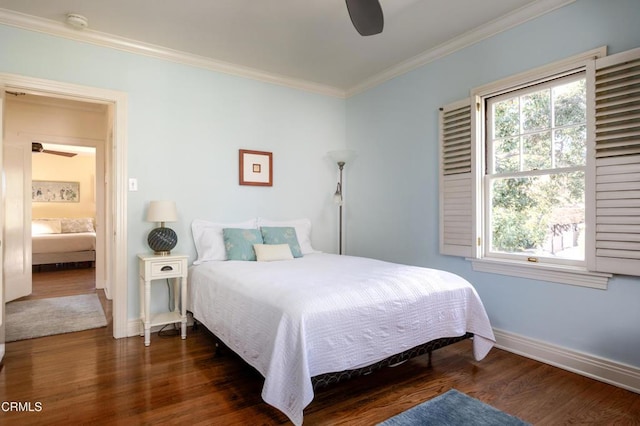 bedroom with baseboards, ceiling fan, dark wood-type flooring, and crown molding