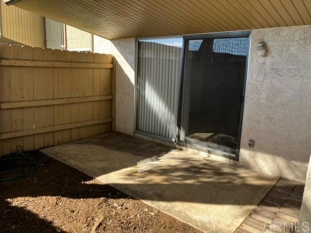 view of patio / terrace with fence