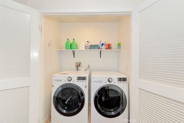 laundry room featuring laundry area and washing machine and dryer