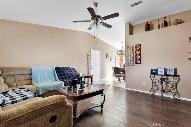 living room featuring lofted ceiling, wood finished floors, visible vents, baseboards, and a ceiling fan