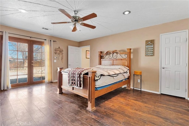 bedroom featuring visible vents, baseboards, dark wood-style floors, access to outside, and french doors