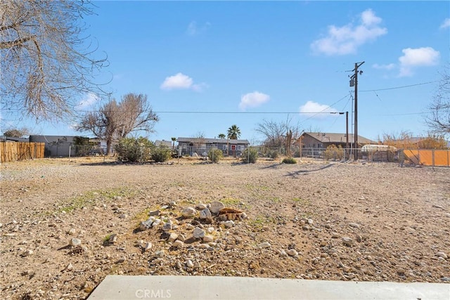 view of yard featuring fence