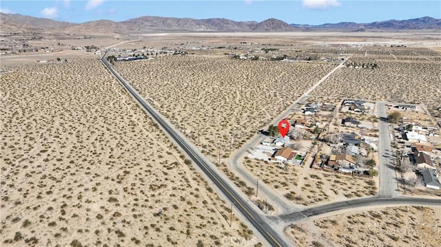 bird's eye view featuring view of desert and a mountain view