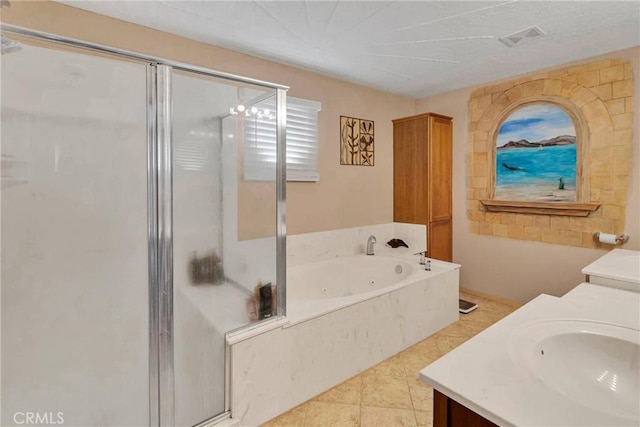 full bath with visible vents, a stall shower, vanity, a jetted tub, and tile patterned floors