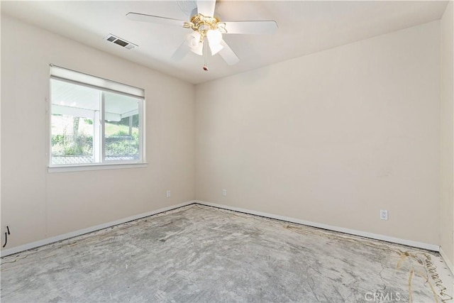 5018 Bluebird Ln, Paso Robles, CA 93446 - spare room with baseboards, a ceiling fan, and concrete floors