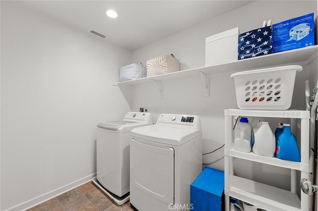 washroom featuring laundry area, baseboards, visible vents, separate washer and dryer, and recessed lighting