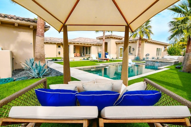 75851 Via Pisa, Indian Wells, CA 92210 - outdoor pool featuring a patio, an outdoor hangout area, an in ground hot tub, a gazebo, and a lawn
