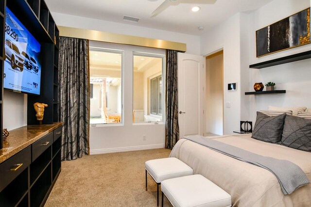 75851 Via Pisa, Indian Wells, CA 92210 - bedroom featuring light carpet, baseboards, visible vents, and ceiling fan