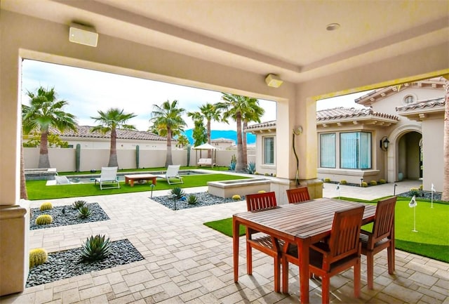 75851 Via Pisa, Indian Wells, CA 92210 - view of patio / terrace featuring outdoor dining space and fence