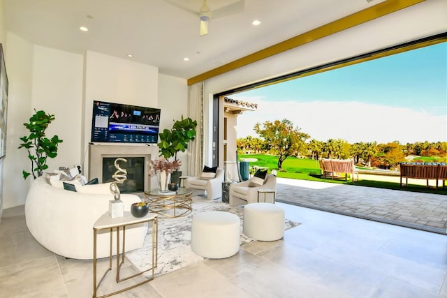 75851 Via Pisa, Indian Wells, CA 92210 - living room featuring plenty of natural light, a fireplace, and recessed lighting