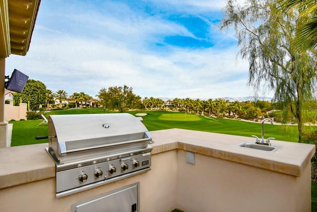 75851 Via Pisa, Indian Wells, CA 92210 - view of patio / terrace featuring view of golf course, a sink, exterior kitchen, and area for grilling