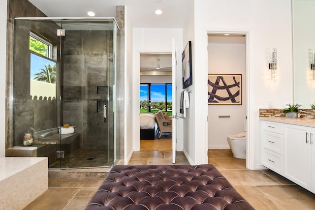 75851 Via Pisa, Indian Wells, CA 92210 - ensuite bathroom featuring toilet, a wealth of natural light, connected bathroom, and vanity