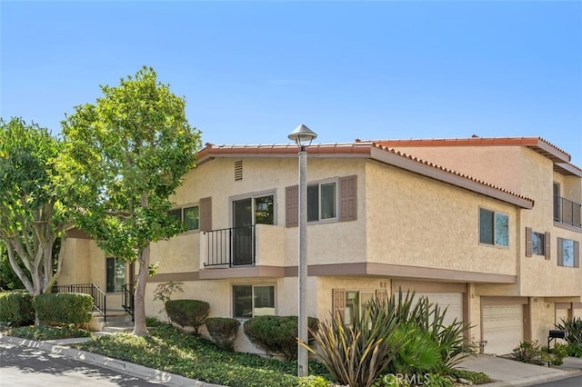 view of property featuring a garage