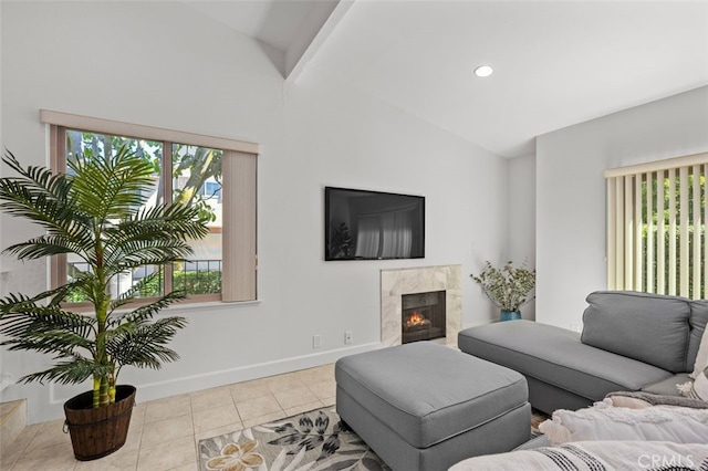 tiled living room featuring lofted ceiling with beams, recessed lighting, a fireplace, and baseboards