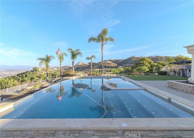 view of pool featuring a mountain view