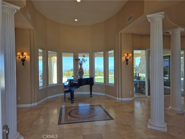 37305 Calle De Lobo, Murrieta, CA 92562 - tiled foyer with decorative columns, baseboards, recessed lighting, and a high ceiling