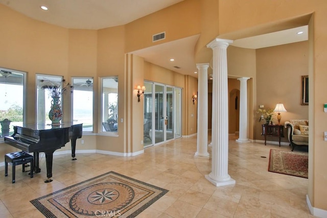 37305 Calle De Lobo, Murrieta, CA 92562 - entrance foyer featuring decorative columns, a high ceiling, and baseboards