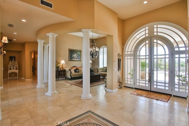 37305 Calle De Lobo, Murrieta, CA 92562 - entryway with ornate columns, french doors, baseboards, a towering ceiling, and recessed lighting