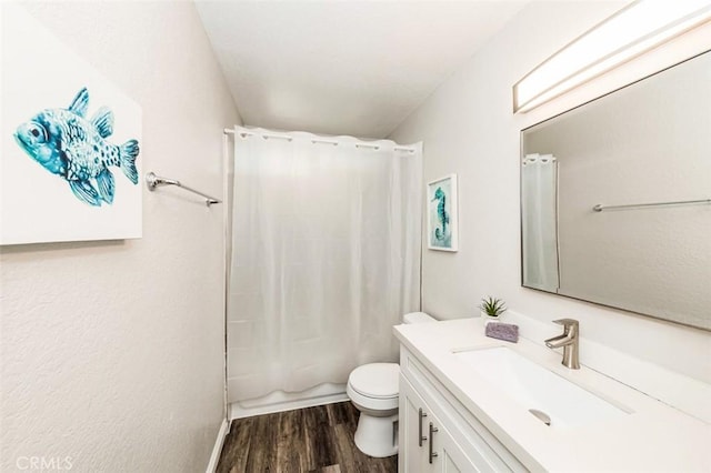 full bathroom featuring shower / bath combination with curtain, vanity, toilet, and wood finished floors