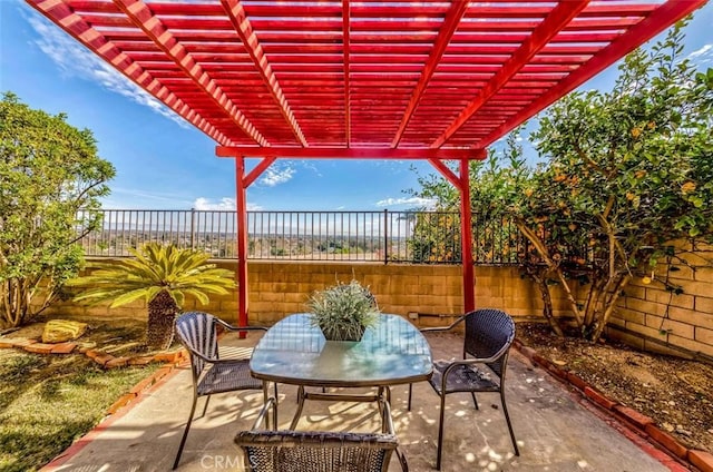 view of patio with a fenced backyard, a pergola, and outdoor dining space