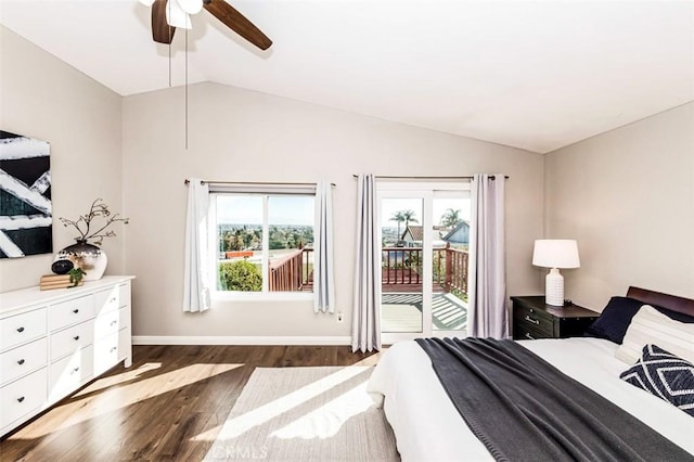 bedroom featuring access to exterior, dark wood-type flooring, vaulted ceiling, ceiling fan, and baseboards