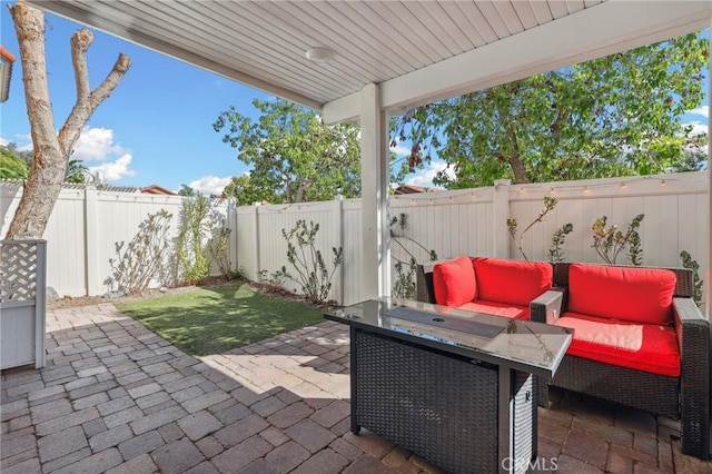 view of patio / terrace featuring outdoor lounge area and a fenced backyard