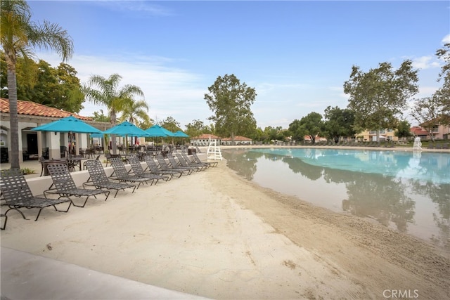 community pool with a gazebo