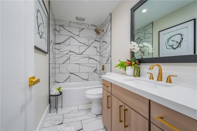 full bath featuring marble finish floor, tub / shower combination, vanity, and toilet