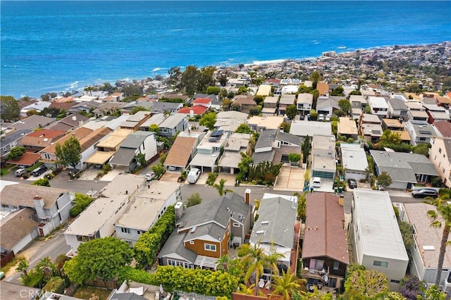 bird's eye view featuring a residential view and a water view