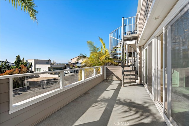 balcony featuring stairway