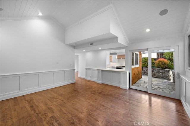 unfurnished living room featuring visible vents, wood finished floors, wooden ceiling, crown molding, and lofted ceiling