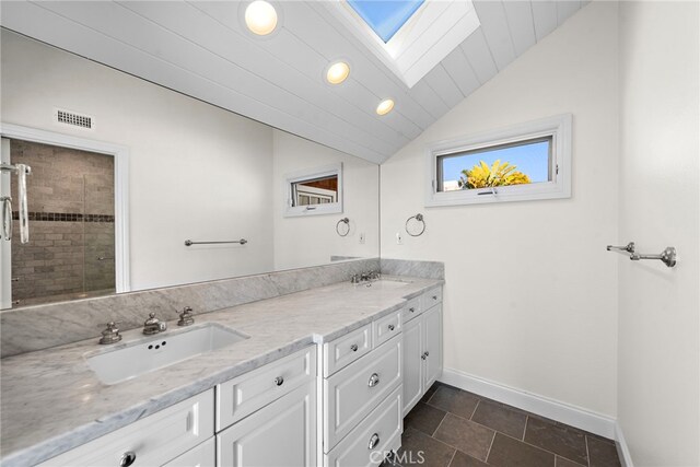 1020 La Mirada St, Laguna Beach, CA 92651 - bathroom featuring baseboards, lofted ceiling, double vanity, a shower stall, and recessed lighting