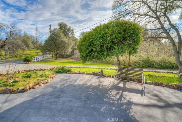 surrounding community featuring a patio area