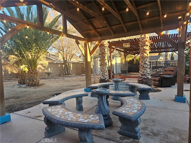 view of patio featuring a gazebo and a fenced backyard