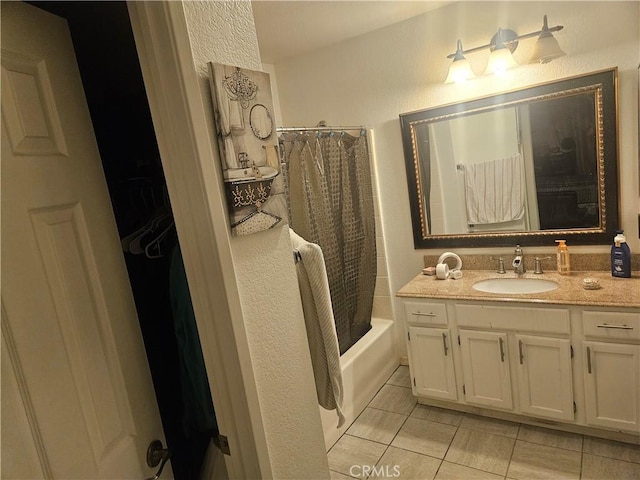 bathroom featuring vanity and shower / bath combo with shower curtain