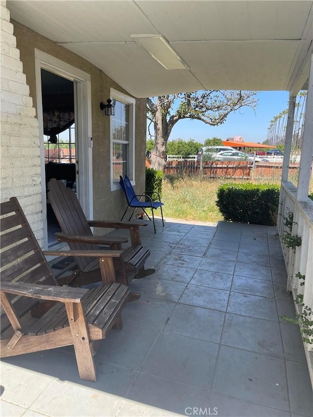 view of patio with fence