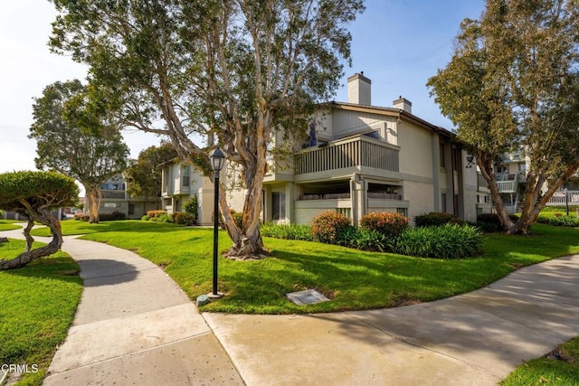 view of building exterior with a residential view