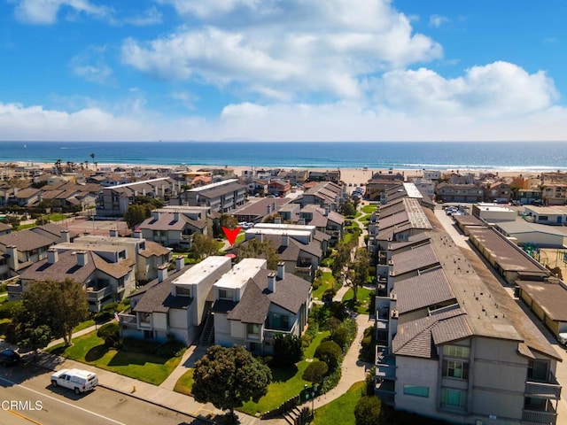 bird's eye view with a water view and a residential view