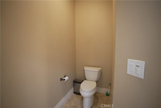 25841 Remington Ct, Tehachapi, CA 93561 - bathroom featuring toilet, tile patterned flooring, and baseboards